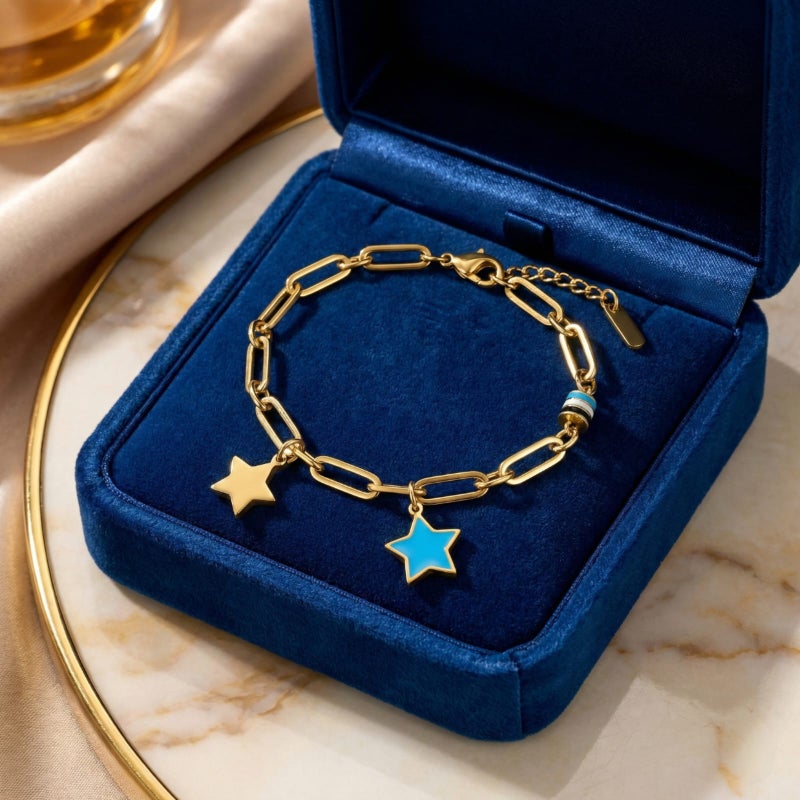 A stylish gold bracelet, crafted from rust-resistant stainless steel, featuring a modern chain design and star-shaped charms (gold and blue). A touch of elegance for your wrist with an adjustable clasp for a perfect fit. - Image 5